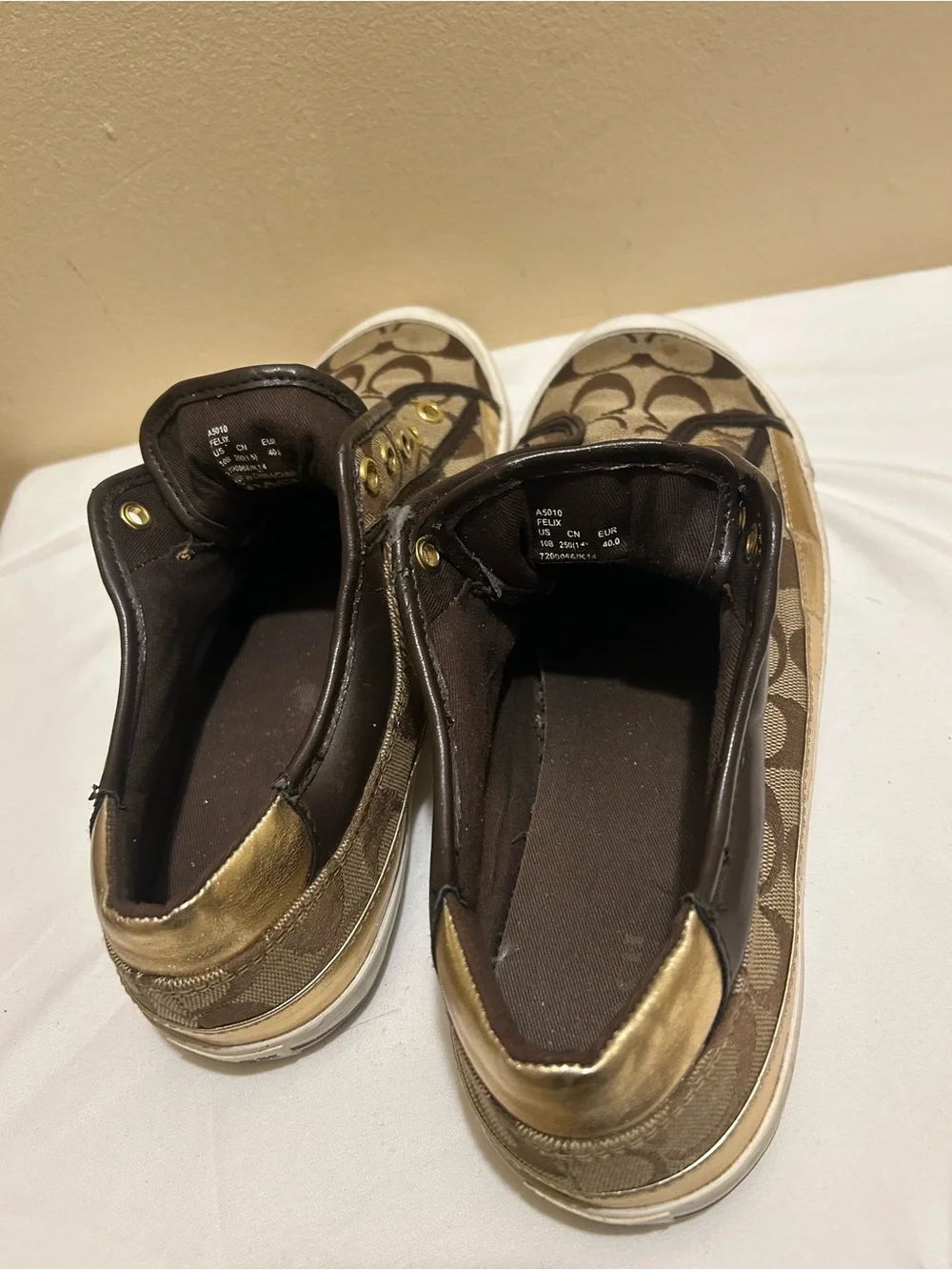Coach Brown Signature Canvas Slip-On Sneakers with Gold Accents